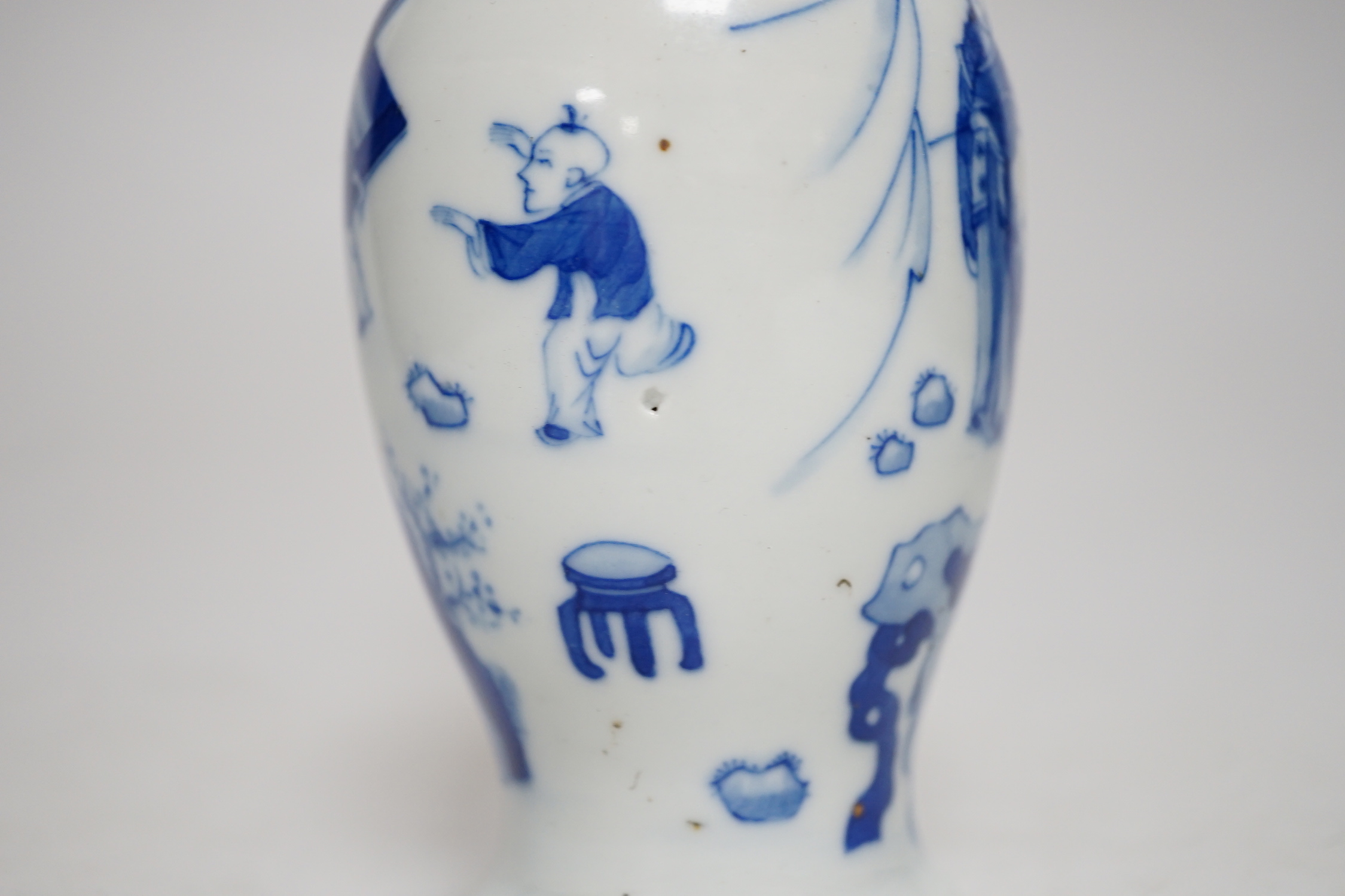 A small Chinese blue and white bottle vase, 17cm high